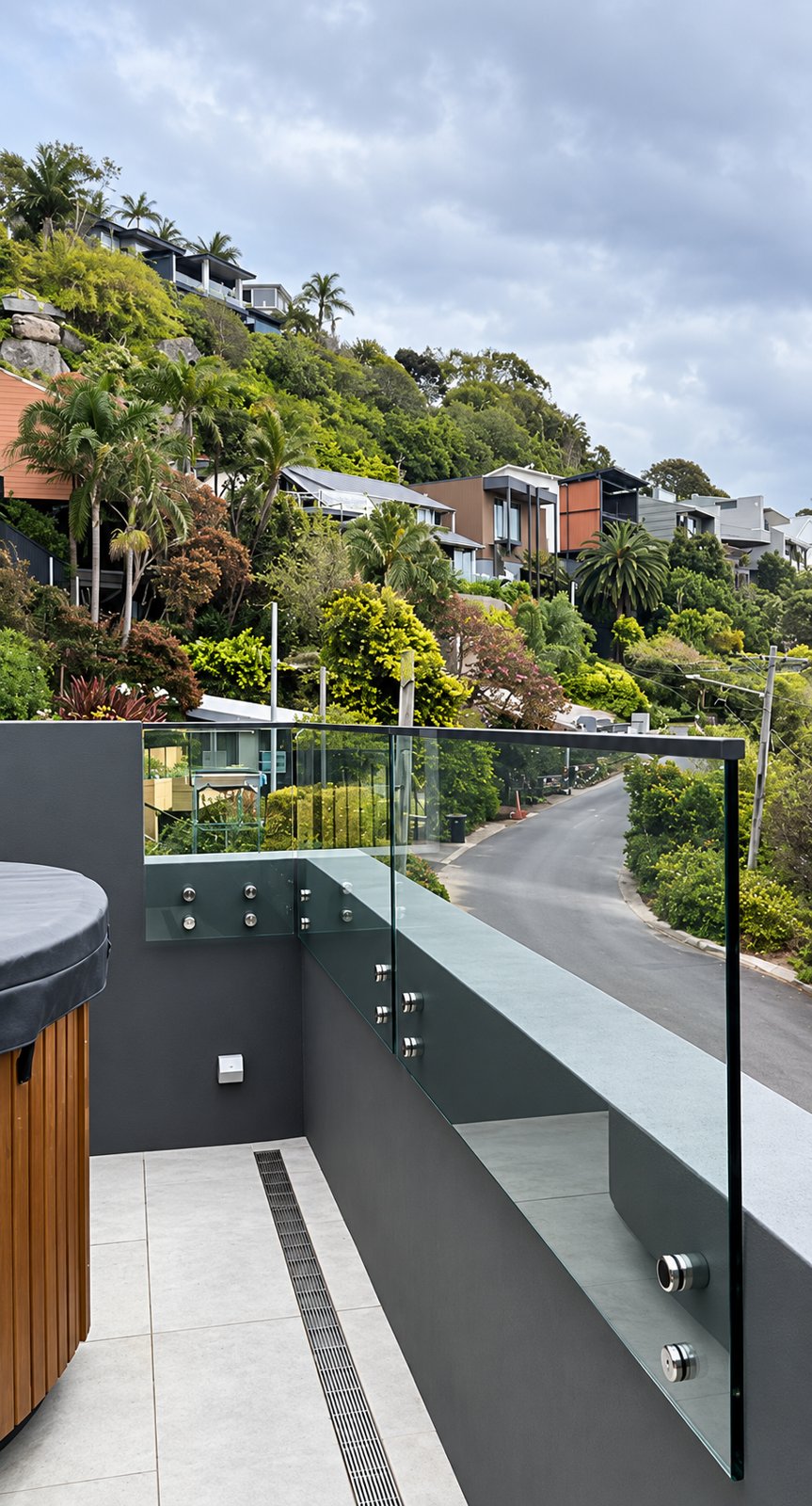 Standoff-mounted glass along the spa terrace, looking back over Whale Beach - Whale Beach house - frameless glass, ocean views