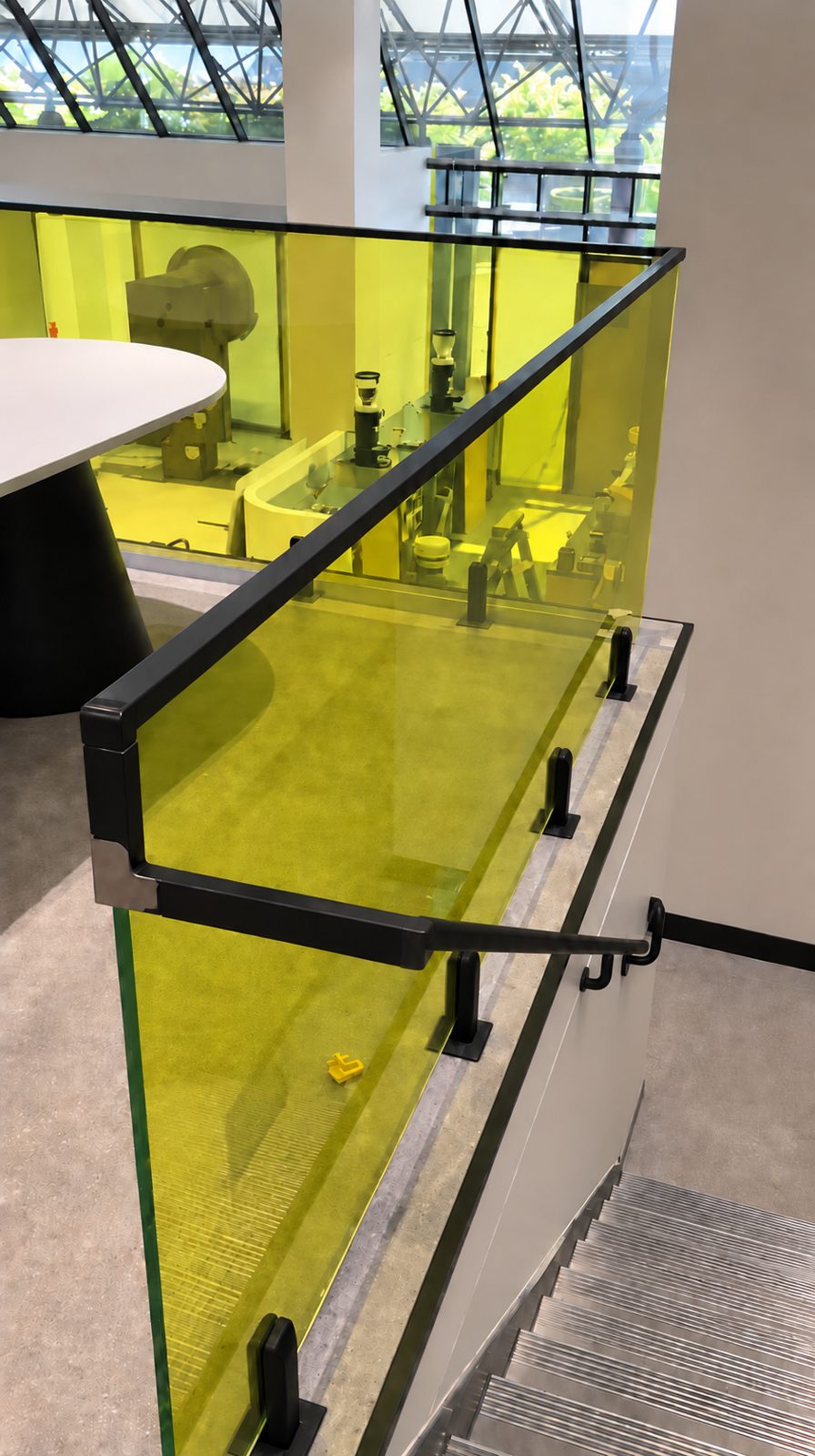 Tinted glass with black top rail along the stairs - Tinted glass balustrade - McDonald's Headquarters, Thornleigh