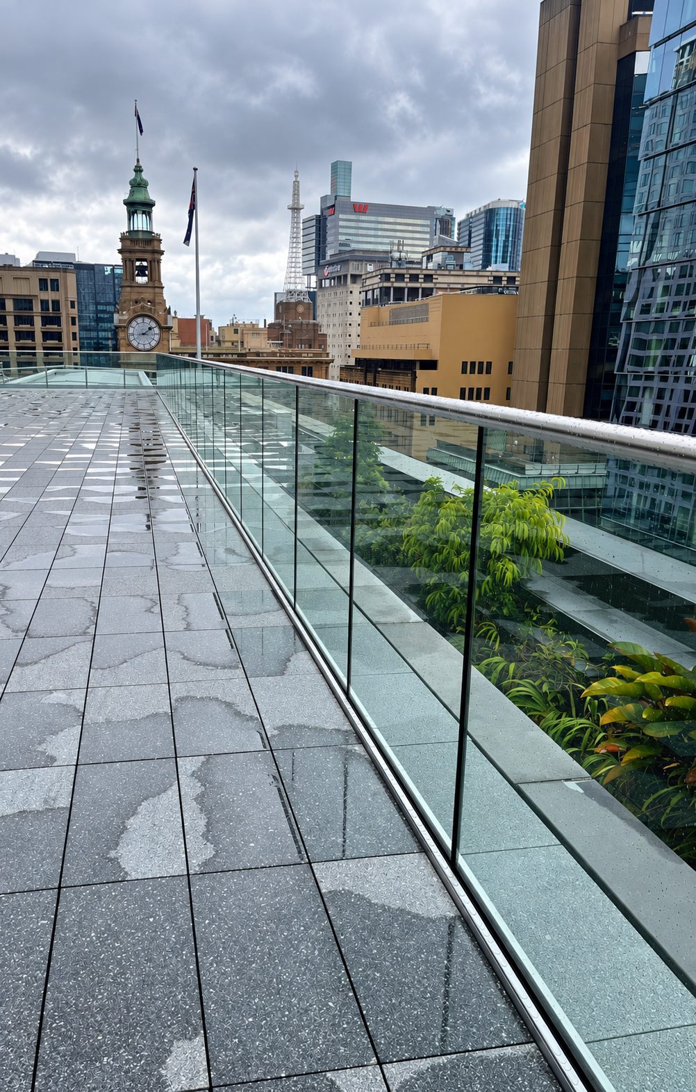 Glass panels with posts along the rooftop walkway - Rooftop glass balustrade, Sydney CBD
