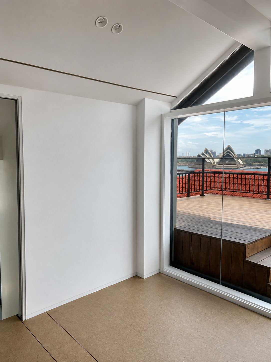 The finished mirror catching the Opera House from the terrace doors - Oversized shaped wall mirror - Kirribilli